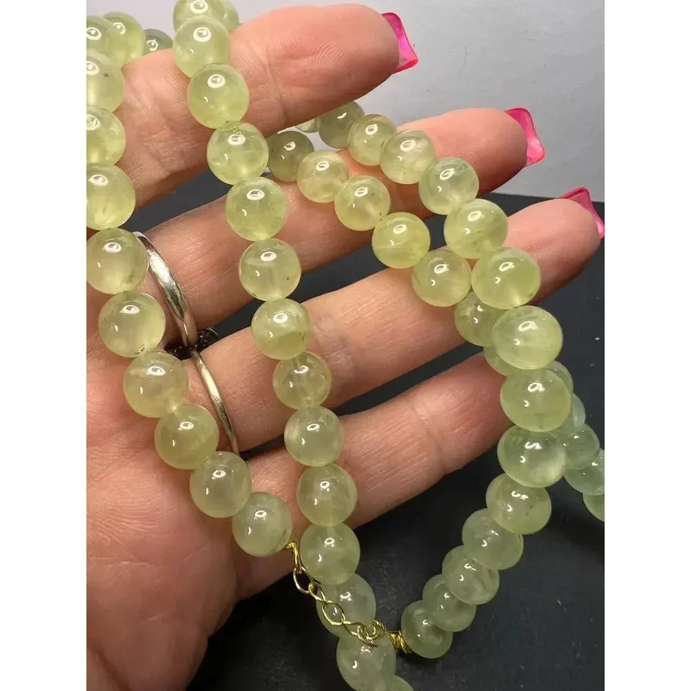 Prehnite beaded necklace with tassel enhancer and gold over sterling silver